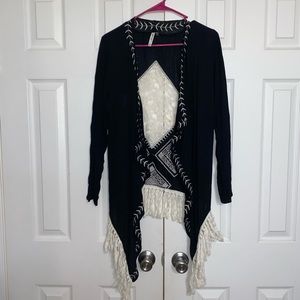 Black cardigan with lace detail and fringe